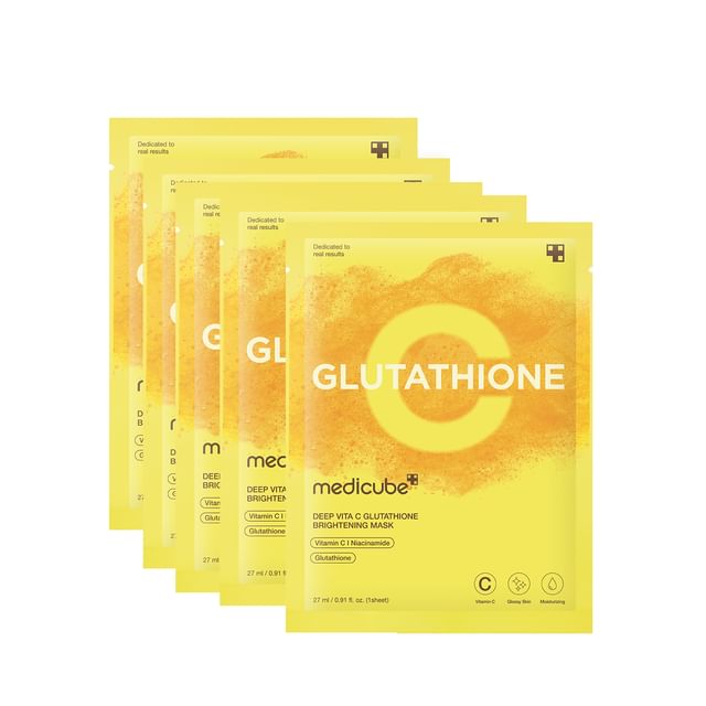 Medicube Deep Vita C Glutathione Brightening Mask sheet unfolded over face showing luminous mask texture