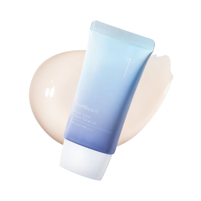 Tube of Numbuzin No.1 Pure Glass Clean Tone Up in light beige tinted shade against soft background