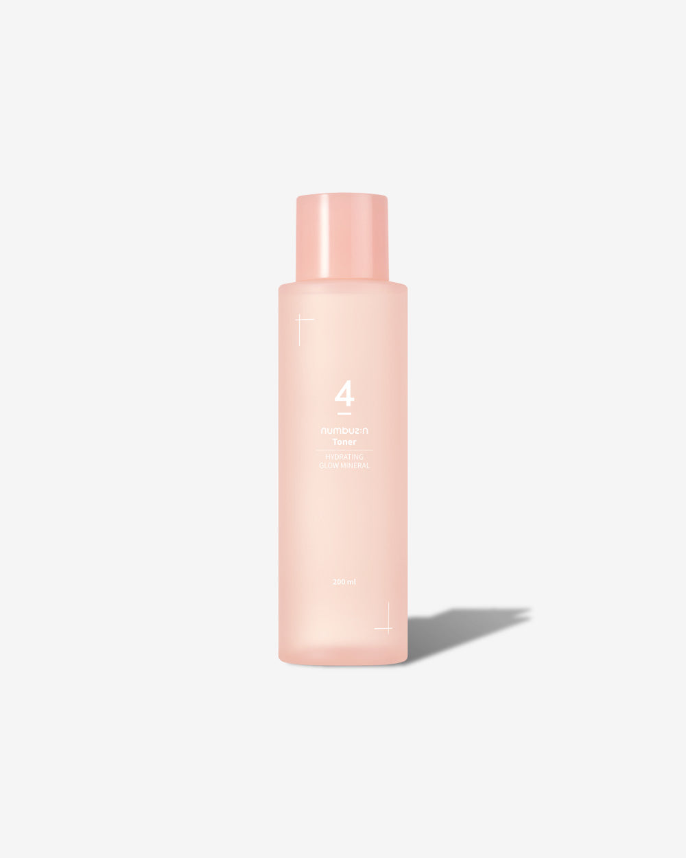Bottle of Numbuzin No.4 Hydrating Glow Mineral Toner with soft milky clear liquid and glowy skin background