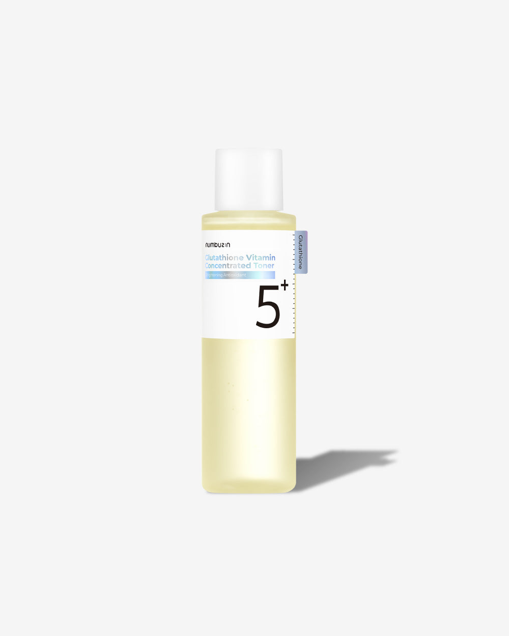 Bottle of Numbuzin No.5 Vitamin Boosting Essential Toner showing light golden/honey tint and radiant skin background
