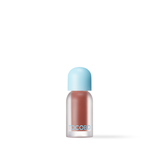 Berry-infused Tocobo plumping lip oil with high-shine glossy finish for smooth and hydrated lips