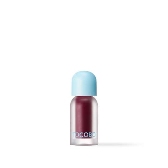 Berry-infused Tocobo plumping lip oil with high-shine glossy finish for smooth and hydrated lips