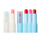 TOCOBO Glow &amp; Glass Tinted Lip Balm in sleek twist-up tube showing shimmering Coral Water shade